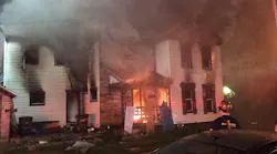 A vacant home in Dayton, OH, burns on Tuesday, July 31, 2018.