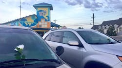 Flowers are left on vehicles in the parking lot of a 'Ride the Ducks' tourist boat business in Branson, MO, after 13 people died when one of the tour boats capsized on a lake during a storm on Thursday, July 19, 2018. Flowers are left on vehicles in the parking lot of a 'Ride the Ducks' tourist boat business in Branson, MO, after 13 people died when one of the tour boats capsized on a lake during a storm on Thursday, July 19, 2018.