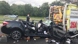 A vehicle sits mangled after firefighters extracted the injured driver, who slammed into the back of their engine as they were responding to another wreck on Saturday, July 21, 2018. A vehicle sits mangled after firefighters extracted the injured driver, who slammed into the back of their engine as they were responding to another wreck on Saturday, July 21, 2018.