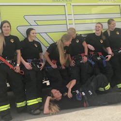 The women of Spokane County Fire District 10 share a laugh before starting their shift on July 3, 2018. The women of Spokane County Fire District 10 share a laugh before starting their shift on July 3, 2018.