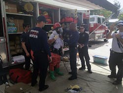 Martin County Hazmat personnel dressing out on scene at a hazmat scene. Martin County Hazmat personnel dressing out on scene at a hazmat scene.