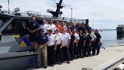 Members of the USCG, NJSP and NJRFTF pose for a group photo in Perth Amboy during port familiarization training in July 2017.