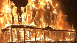 The 114-year-old Oakland Hotel in Webster Springs, WV, was fully engulfed in flames by the time a firefighter with the first arriving unit snapped this photo on Friday, July 20, 2018.