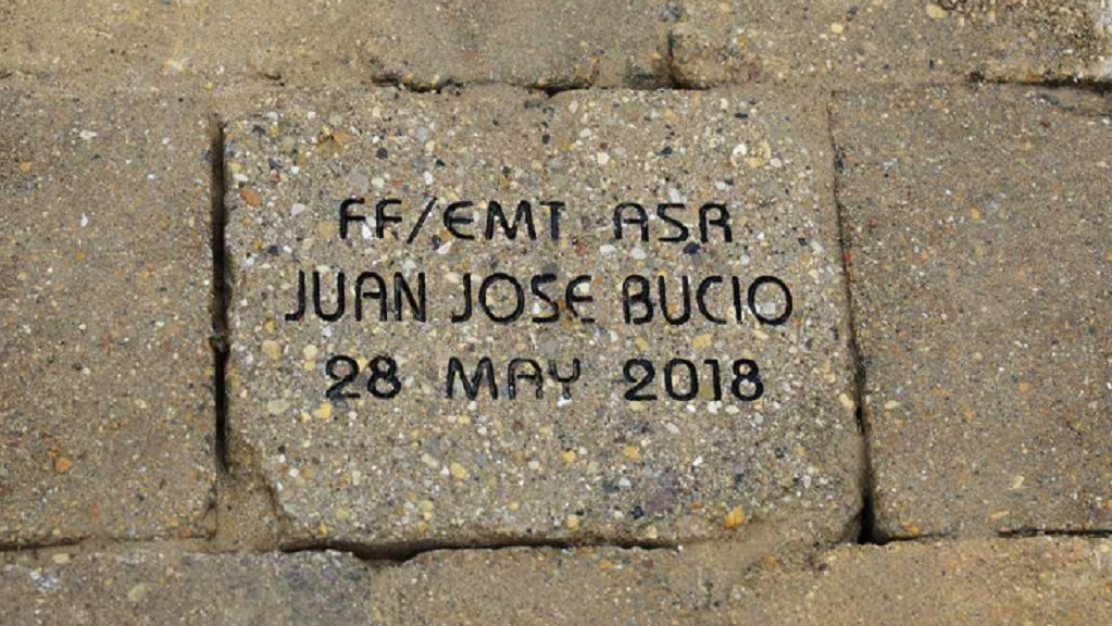 A brick honoring fallen Chicago firefighter Juan Bucio that was unveiled at the Fallen Firefighter and Paramedic Memorial Park on the Lake Michigan shore on Tuesday, Aug. 21, 2018.