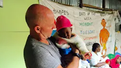 Burton, SC, fire Capt. Bobby Davidson holds a child being aided by his mission on one of his trips to Kibera outside Nairobi in Kenya in February 2018. Burton, SC, fire Capt. Bobby Davidson holds a child being aided by his mission on one of his trips to Kibera outside Nairobi in Kenya in February 2018.