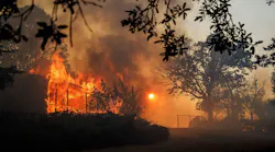 A home near Hendricks Road is engulfed in flames as the River Fire spreads near Lakeport, CA, on Tuesday, July 31, 2018.