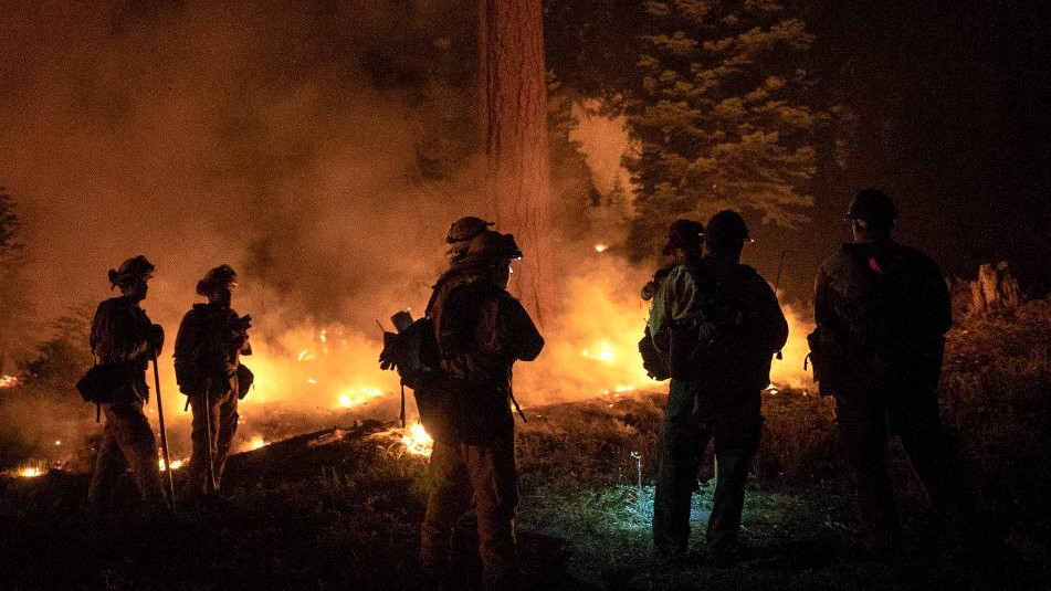 Firefighters conducting overnight operations against the Carr Fire in Shasta County, CA, on Thursday, Aug. 16, 2018.