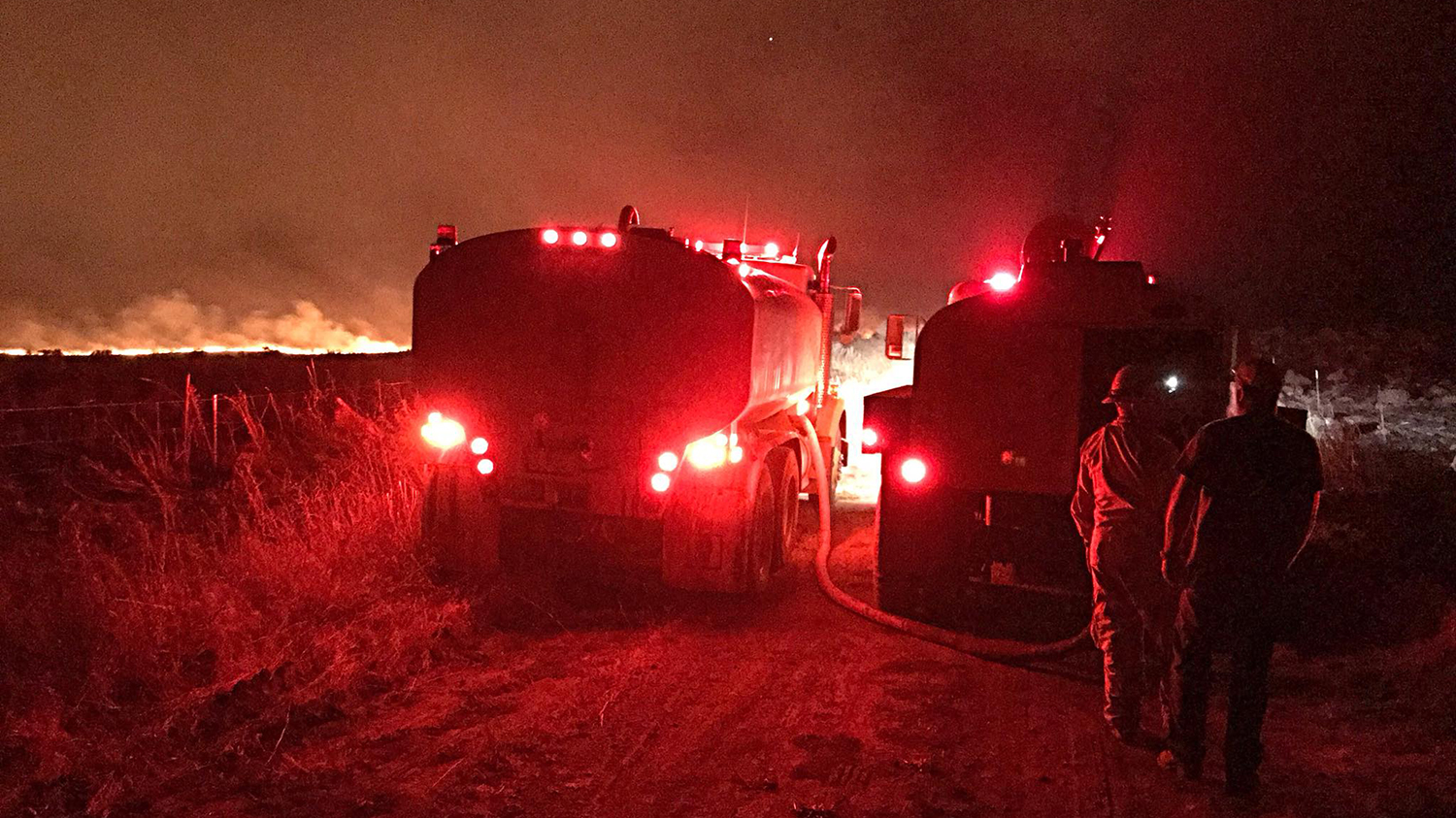 Firefighters from Grant County Fire District 13 work the Grass Valley Fire.