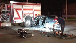 A vehicle rests partially wedged beneath a Houston Fire Department apparatus after slamming into it while it was backing into a station on Wednesday, Aug. 15, 2018. A vehicle rests partially wedged beneath a Houston Fire Department apparatus after slamming into it while it was backing into a station on Wednesday, Aug. 15, 2018.