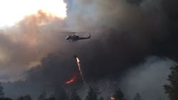A firefighting helicopter during operations against the Mendocino Complex Fire on Sunday, Aug. 26, 2018. A firefighting helicopter during operations against the Mendocino Complex Fire on Sunday, Aug. 26, 2018.