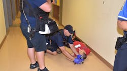 Reading fire personnel attend to a mock victim during an active shooter simulation on the campus of Alvernia University on Thursday, Aug. 17, 2018.