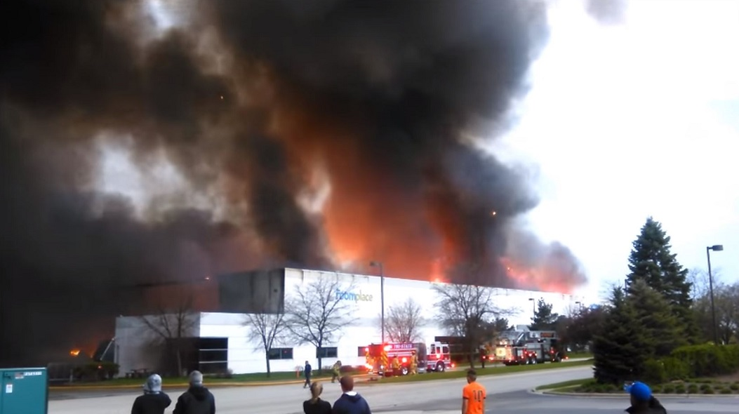 The RoomPlace warehouse burns in an arson fire in the southwestern Chicago suburb of Woodridge on April 21, 2016.