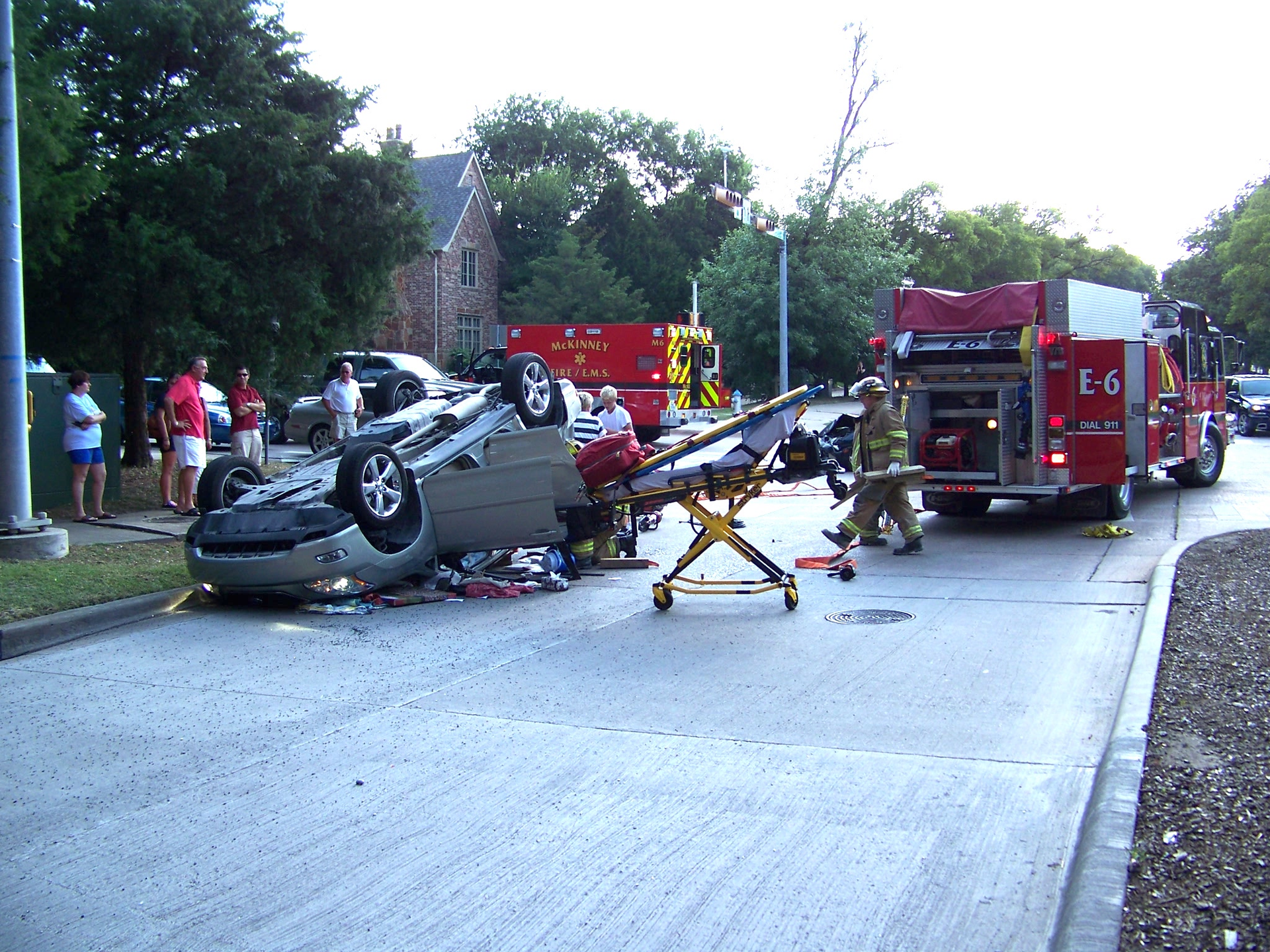 Command is established as the first-due company officer arrives. A walk-around size-up of the entire scene reveals that one of the two vehicles involved is a roof-resting SUV with one person trapped inside.