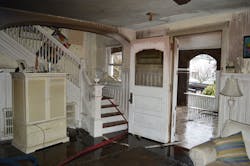 The stairwell leading to the second-floor hallway where Firefighter Funk's incident occurred, forcing him to dive down the stairs to exit. The stairwell leading to the second-floor hallway where Firefighter Funk's incident occurred, forcing him to dive down the stairs to exit.
