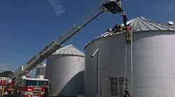 Upon arrival, the aerial was extended to prepare for the rescue of the man from the grain bin.