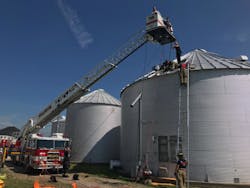 Upon arrival, the aerial was extended to prepare for the rescue of the man from the grain bin.