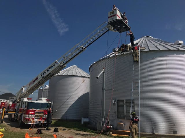 Upon arrival, the aerial was extended to prepare for the rescue of the man from the grain bin.