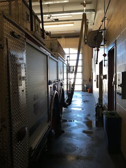 Figure 2: Example of flexible duct ventilation system at a fire station. Figure 2: Example of flexible duct ventilation system at a fire station.