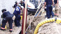 Strong-back panels were placed into the trench to protect the patient and rescuers.