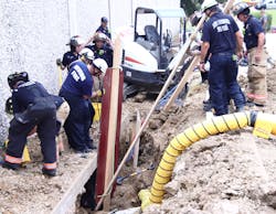 Strong-back panels were placed into the trench to protect the patient and rescuers. Strong-back panels were placed into the trench to protect the patient and rescuers.