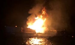 Photo Caption: One of three barges from which fireworks were launched at Lake Tahoe’s “Lights on the Lake” celebration caught fire in the early morning hours of July 5th. The Tahoe Douglas Fire Protection District quickly responded with Marine 24, its new Lake Assault fireboat. The fire, with flames reaching an estimated 30-feet tall, was extinguished in six minutes. Photo Caption: One of three barges from which fireworks were launched at Lake Tahoe’s “Lights on the Lake” celebration caught fire in the early morning hours of July 5th. The Tahoe Douglas Fire Protection District quickly responded with Marine 24, its new Lake Assault fireboat. The fire, with flames reaching an estimated 30-feet tall, was extinguished in six minutes.