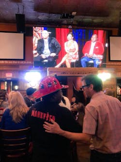 Emanuel “Chef Manny” Washington (left) at a viewing party held Sunday night in Orlando. Emanuel “Chef Manny” Washington (left) at a viewing party held Sunday night in Orlando.
