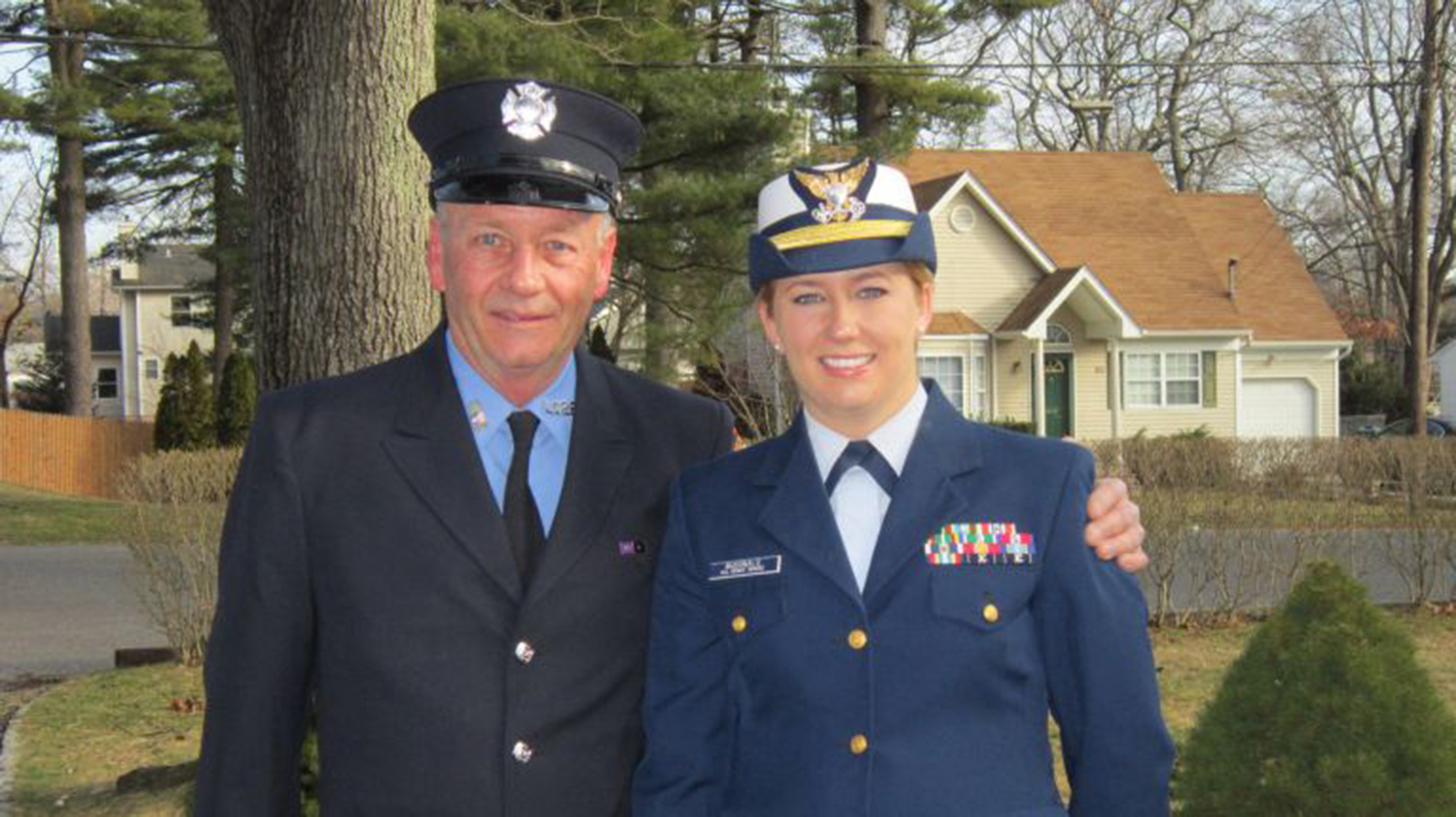 Michael McDonald, with his daughter Alyssa Folts, before a 2012 parade.