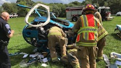 West Bloomfield firefighters on scene after a private helicopter crashed in Orchard Lake, MI, on Monday, Sept. 03, 2018. West Bloomfield firefighters on scene after a private helicopter crashed in Orchard Lake, MI, on Monday, Sept. 03, 2018.