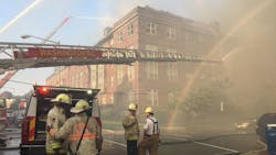 Firefighters on scene during a fire at a senior apartment complex in Washington DC on Wednesday, Sept. 19, 2018.