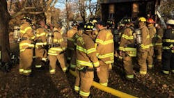 Evansville volunteer firefighters during a controlled training burn in December 2017. Evansville volunteer firefighters during a controlled training burn in December 2017.