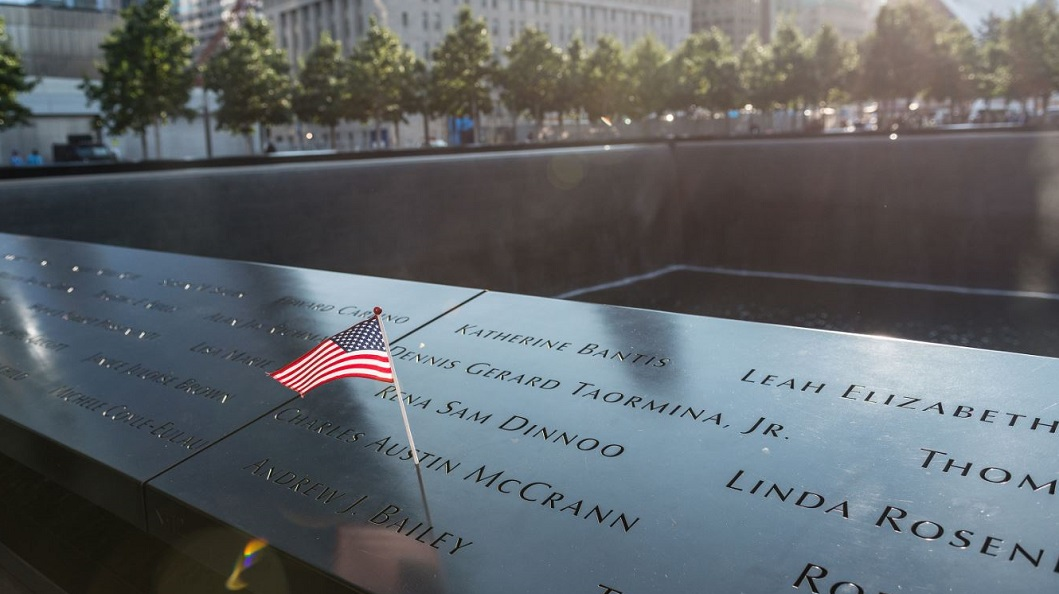 Names of victims adorn a memorial on the perimeter of the reflecting pool at the World Trade Center site in New York.
