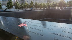 Names of victims adorn a memorial on the perimeter of the reflecting pool at the World Trade Center site in New York.