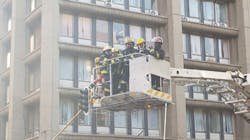 Firefighters are bought down from the upper floors of a high-rise after containing a fire that took the lives of three colleagues in Johannesburg, South Africa, on Wednesday, Sept. 5, 2018. Firefighters are bought down from the upper floors of a high-rise after containing a fire that took the lives of three colleagues in Johannesburg, South Africa, on Wednesday, Sept. 5, 2018.