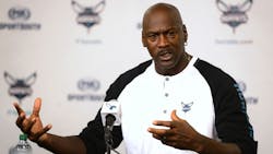 Charlotte Hornets owner Michael Jordan responds to a question during a news conference on Oct. 28, 2014, at Time Warner Cable Arena in Charlotte, NC.