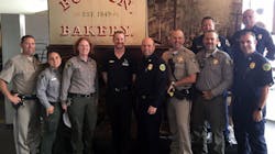 IndyCar Series driver Charlie Kimball, fourth from left, with first responders who worked the 2017 North Bay fires. IndyCar Series driver Charlie Kimball, fourth from left, with first responders who worked the 2017 North Bay fires.