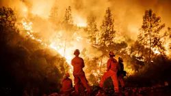 Firefighters monitor a burn operation near Ladoga, CA, on Aug. 7, 2018. Firefighters monitor a burn operation near Ladoga, CA, on Aug. 7, 2018.