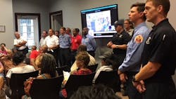 Moss Point, MS, firefighters attend a board meeting on Tuesday, Sept. 18, 2018, where they presented a petition of protest on a proposed restructuring of the city's fire department. Moss Point, MS, firefighters attend a board meeting on Tuesday, Sept. 18, 2018, where they presented a petition of protest on a proposed restructuring of the city's fire department.
