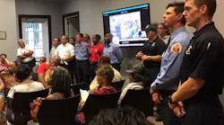 Moss Point, MS, firefighters attend a board meeting on Tuesday, Sept. 18, 2018, in support of Fire Chief Tommy Posey.