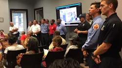 Moss Point, MS, firefighters attend a board meeting on Tuesday, Sept. 18, 2018, in support of Fire Chief Tommy Posey.