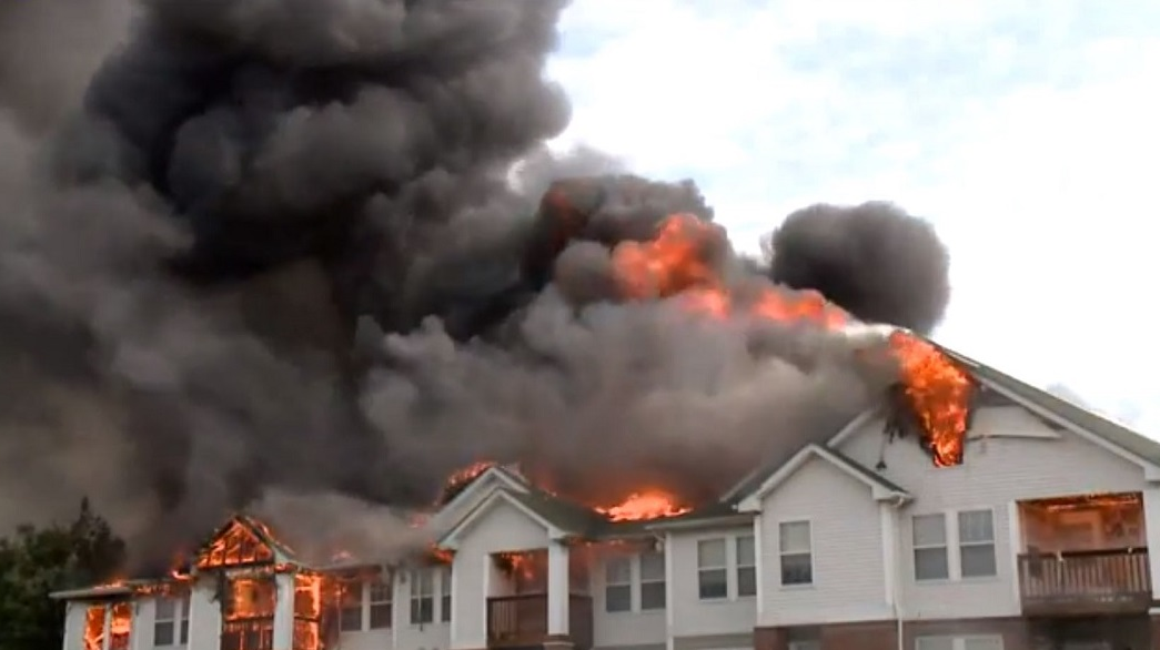 A massive fire consumes a sprawling condominium complex in Olmsted Falls, OH, on Thursday, Sept. 20, 2018.
