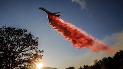 An air tanker drops fire retardant on the River Fire in Lakeport, CA, on Aug. 1, 2018.