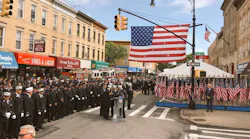 FDNY members gather on Wednesday, Sept. 26, 2018, to honor firefighter William Tolley at a ceremony unveiling a plaque and renaming a Queens street after him.