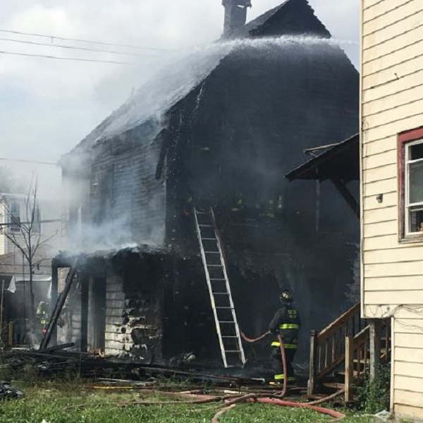 Chicago police were assisting firefighters during a fire at this Southeast Side home when two of them caught a 7-year-old boy who was tossed from a second-floor window on Sunday, Sept. 9, 2018.