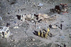 Firefighters remove the remains of one of the six firefighters killed in the explosion. Firefighters remove the remains of one of the six firefighters killed in the explosion.