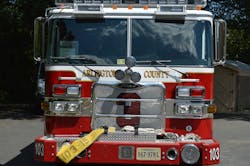 Arlington County, VA, Engine 103 operates this apparatus with a 19-inch bumper extension with a notched bumper for the front intake and raised hose tray for the trash line. Note the short handrails below the windshield and reinforced steel bumper. Arlington County, VA, Engine 103 operates this apparatus with a 19-inch bumper extension with a notched bumper for the front intake and raised hose tray for the trash line. Note the short handrails below the windshield and reinforced steel bumper.