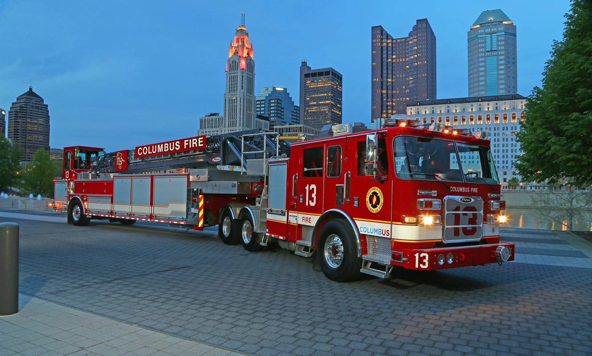 A whole collection of Amdor roll-up doors, including ones on the cab, were installed on a tiller aerial built by Pierce Mfg.