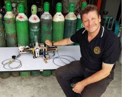 EasyTek President Stephen Burton with the Haskel oxygen boost pump used in the cave rescue.