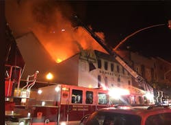Baltimore fire officials called for four alarms to battle the fire.