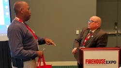 Retired Battalion Chief Robert Avsec, right, speaks with a Firehouse Expo attendee after his presentation on the identity crisis in the fire service. Retired Battalion Chief Robert Avsec, right, speaks with a Firehouse Expo attendee after his presentation on the identity crisis in the fire service.