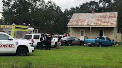 Louisiana state fire officials on scene after a fatal fire in the Baton Rouge area.